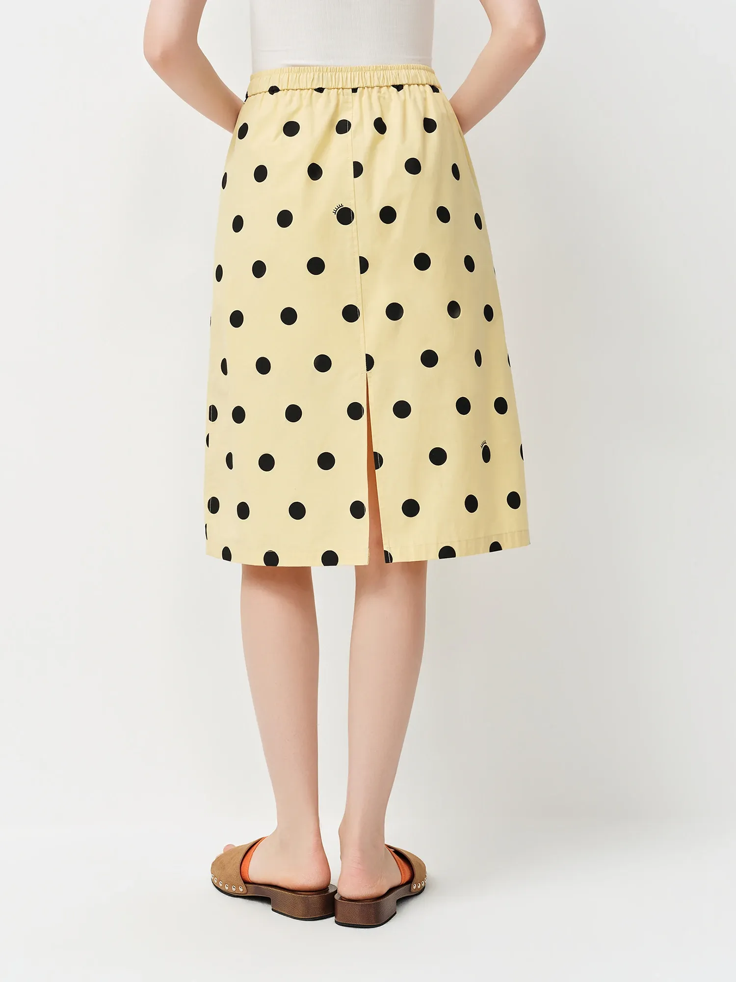 Jupe trapèze à pois en coton, taille empire et longueur genou