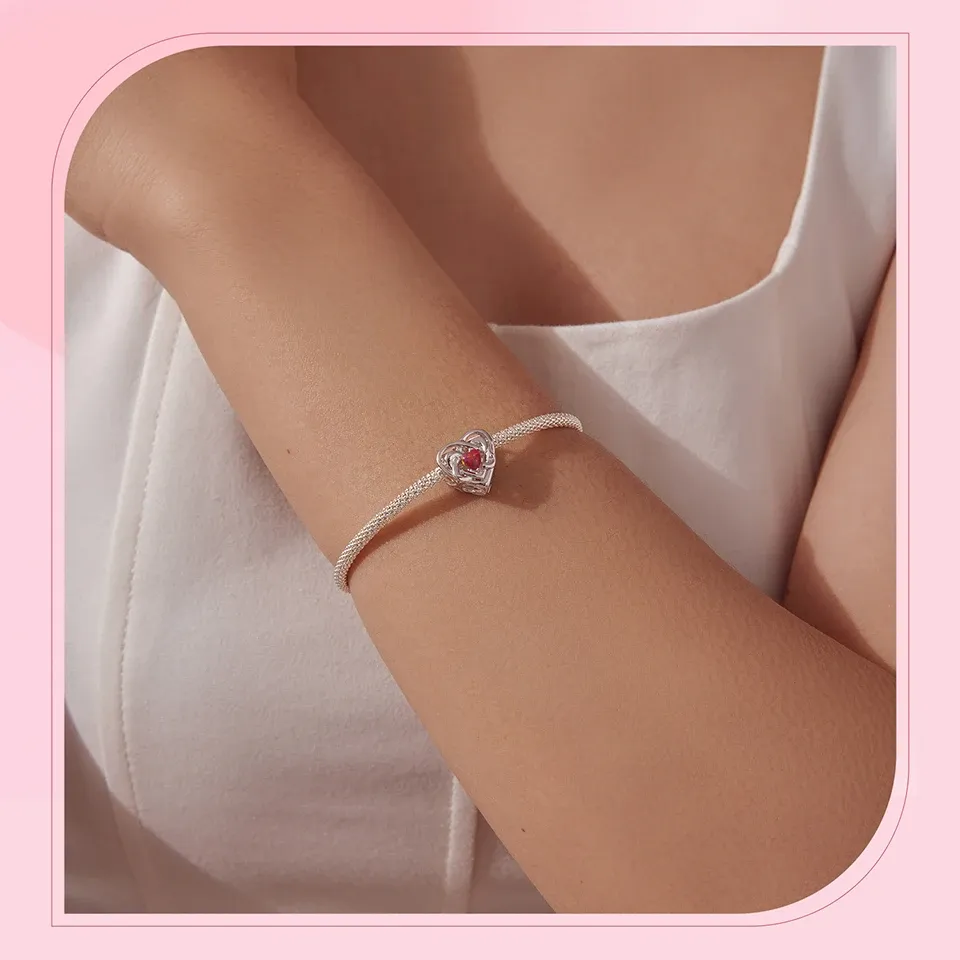 Breloque cœur noué en argent 925 WOSTU