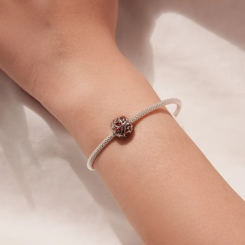 Breloque ronde WOSTU « Amour infini » en cuivre