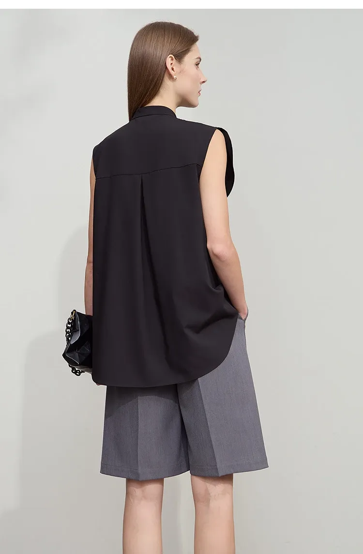 Blouse sans manches AMII à col montant et volants, esprit bureau été 2025