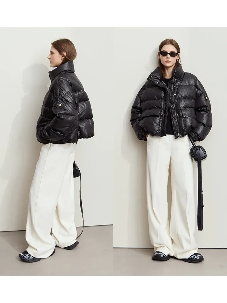 Doudoune minimaliste AMII en duvet de canard, col montant et finition effet cuir