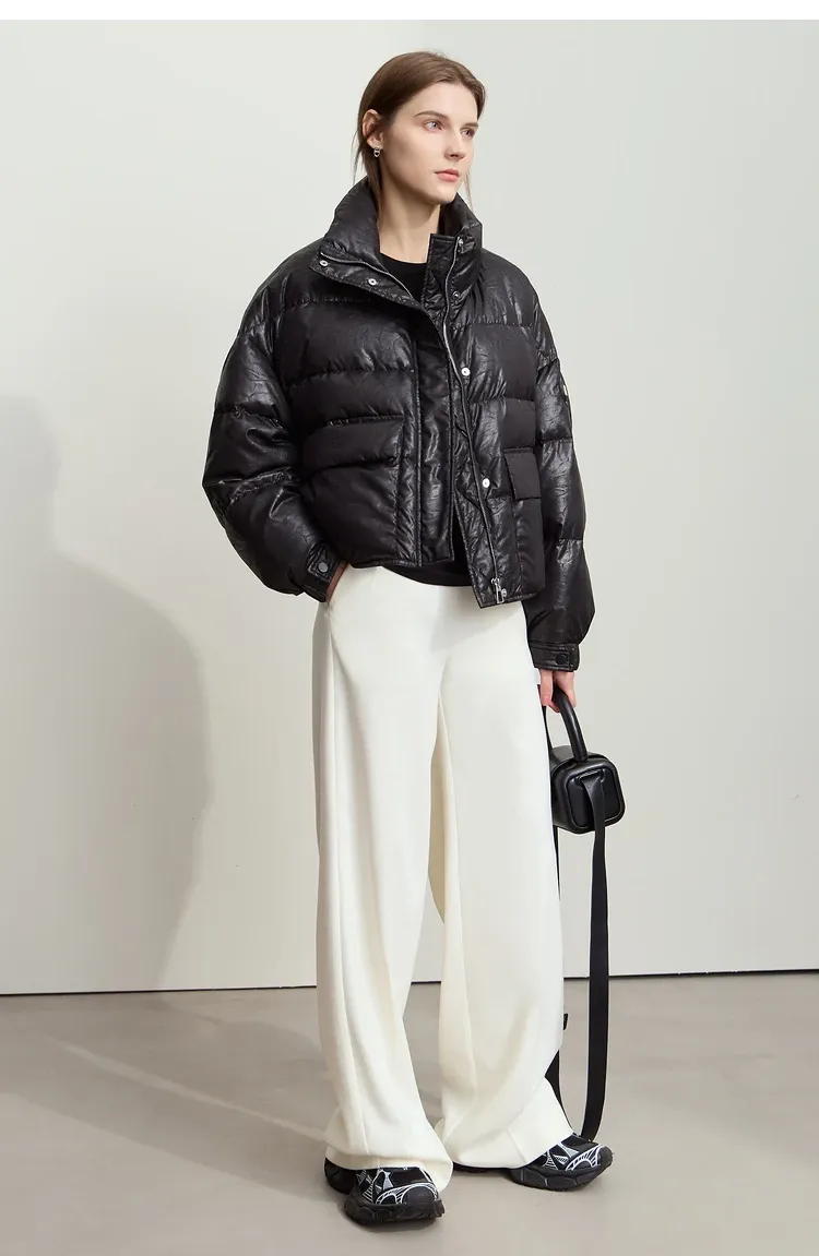 Doudoune minimaliste AMII en duvet de canard, col montant et finition effet cuir