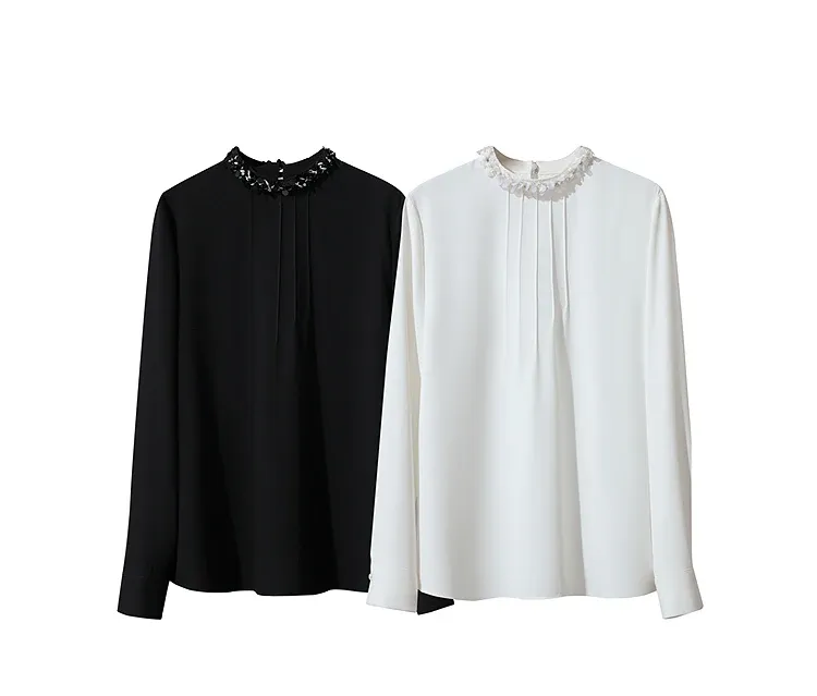 Chemisier blanc minimaliste AMII à col montant et mousseline